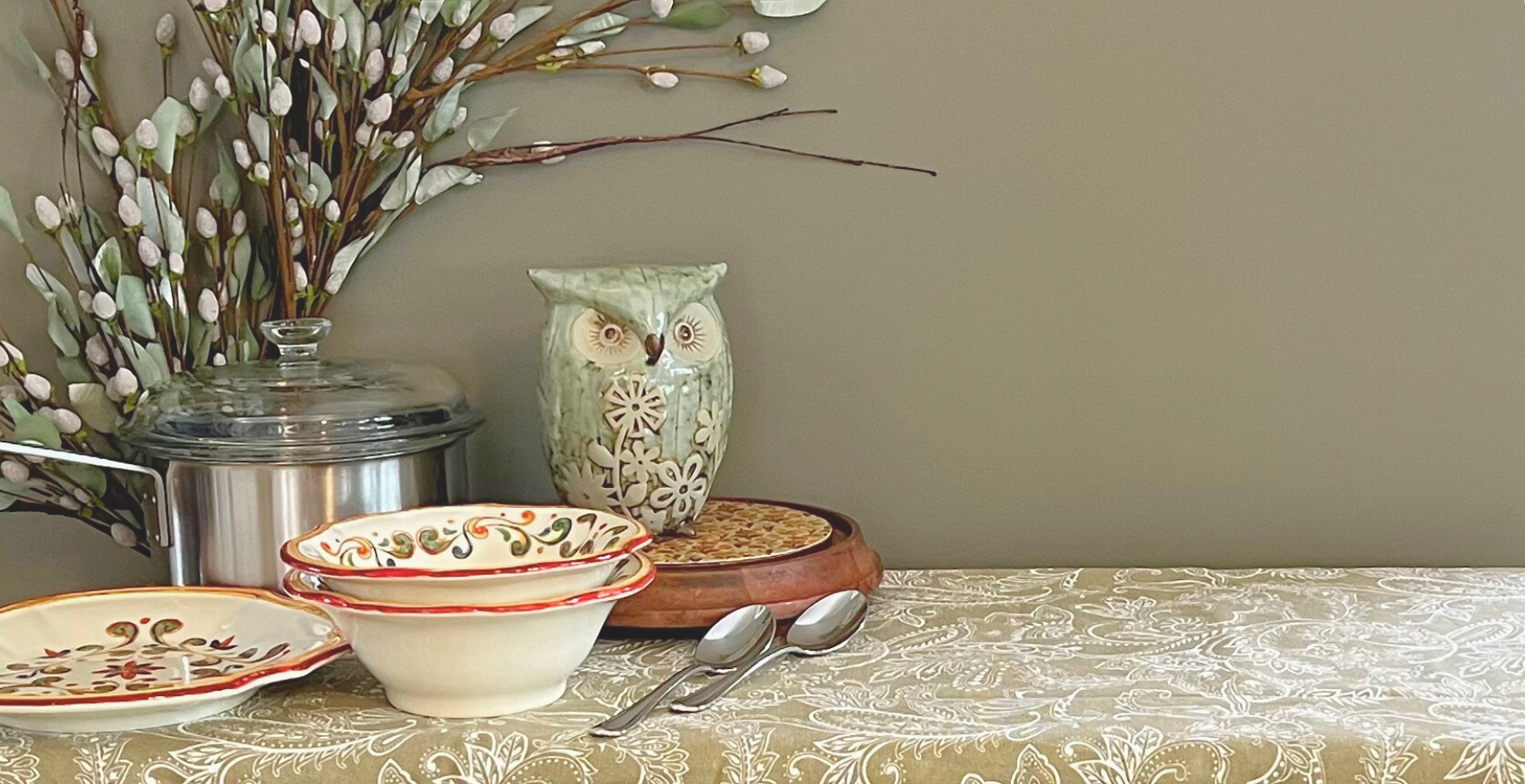 Saucepan, scroll dishes, florals and green ceramic owl at My Cousin's Cottage