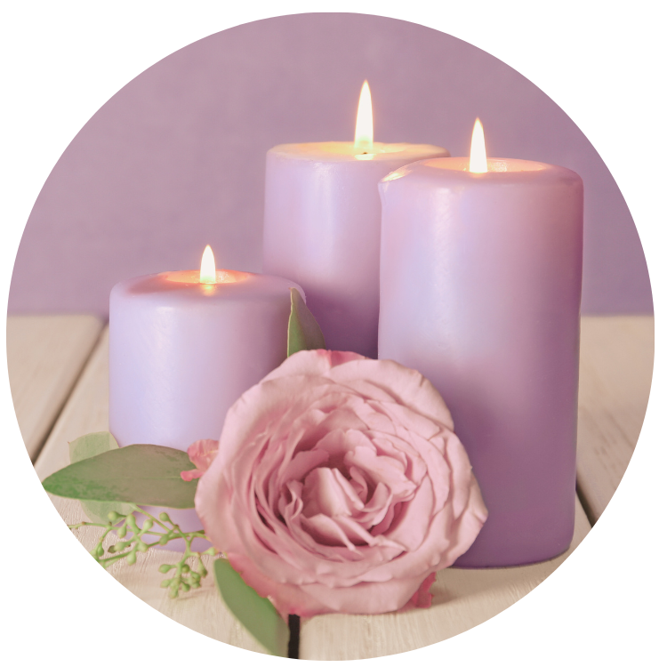 Purple candles and pink flower