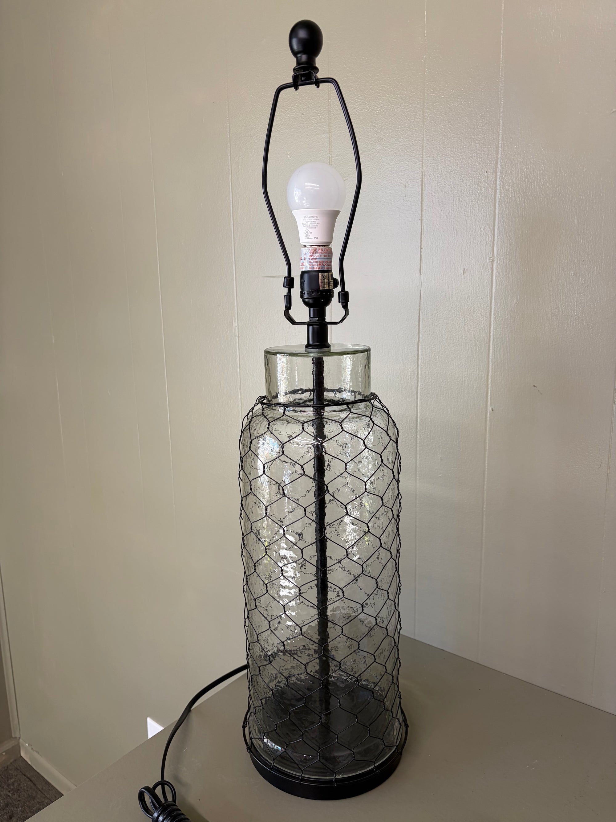 A Glass and Wire Lamp