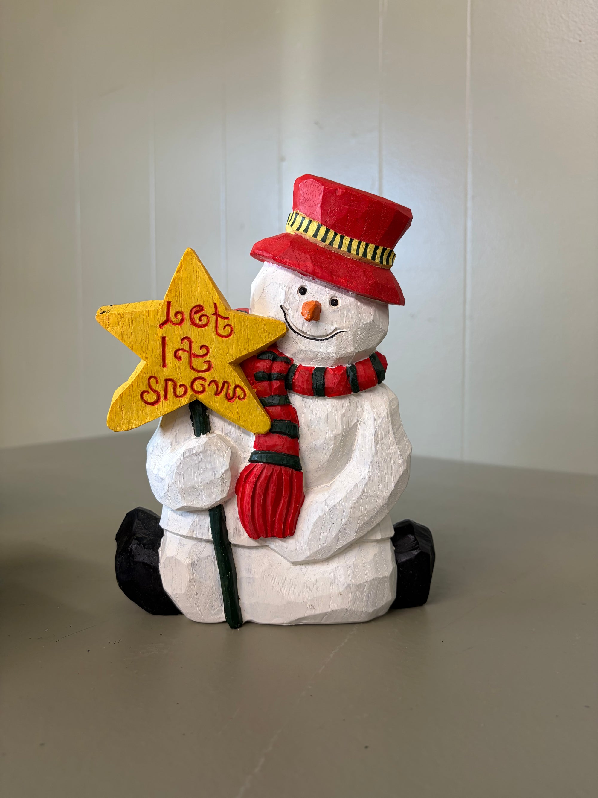 Snowman Holding Star