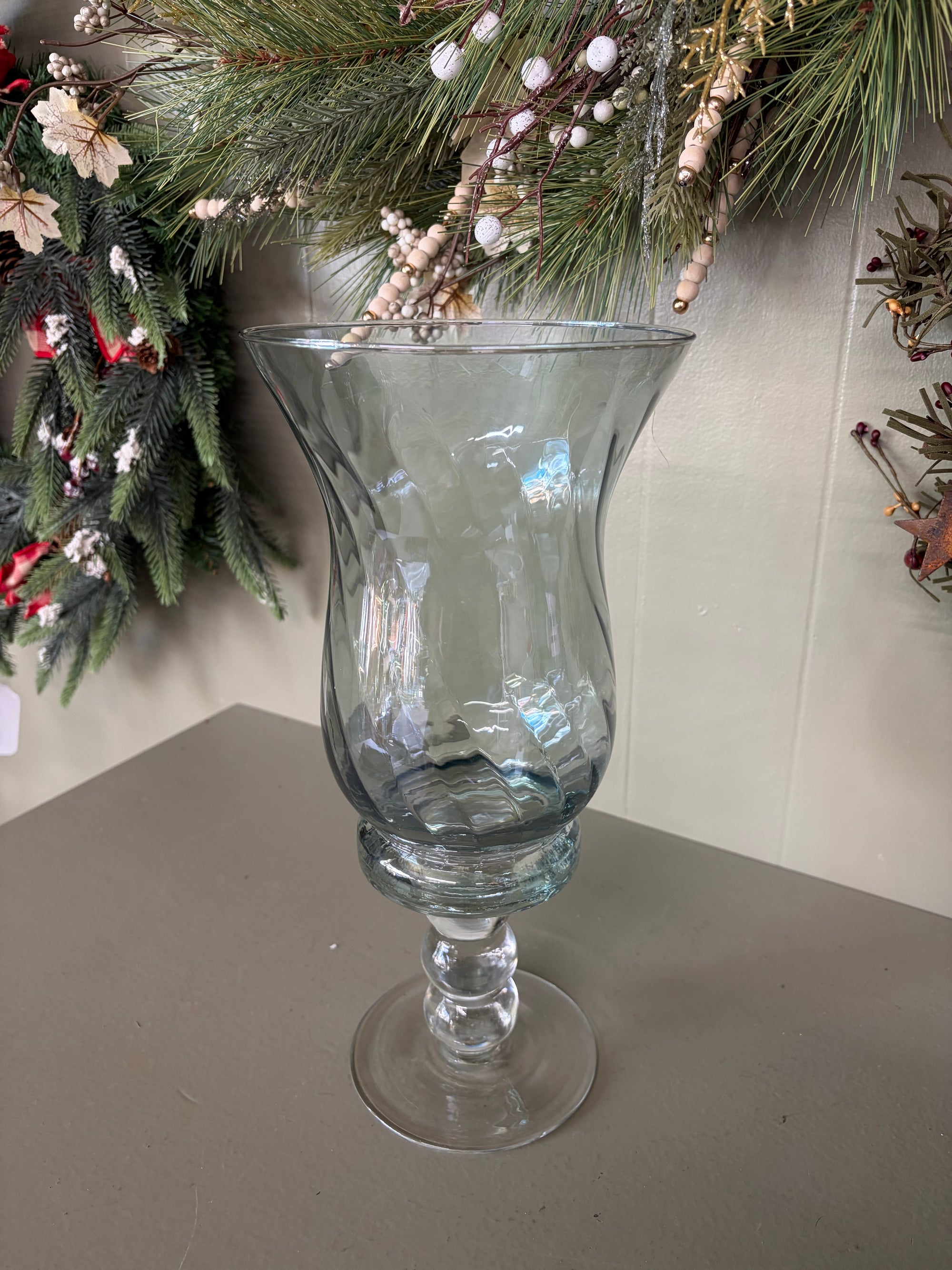 Clear glass pedestal vase