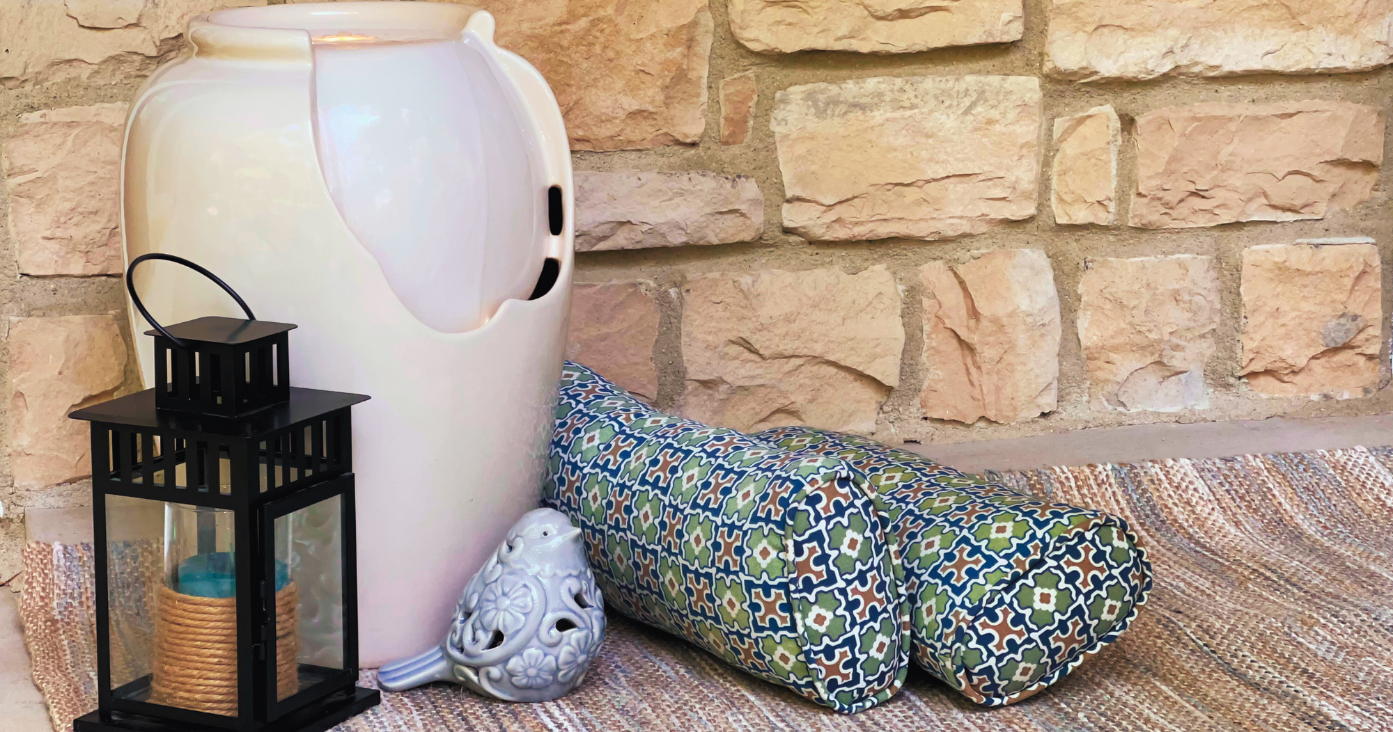 Water fountain, outdoor pillows, bird and lantern