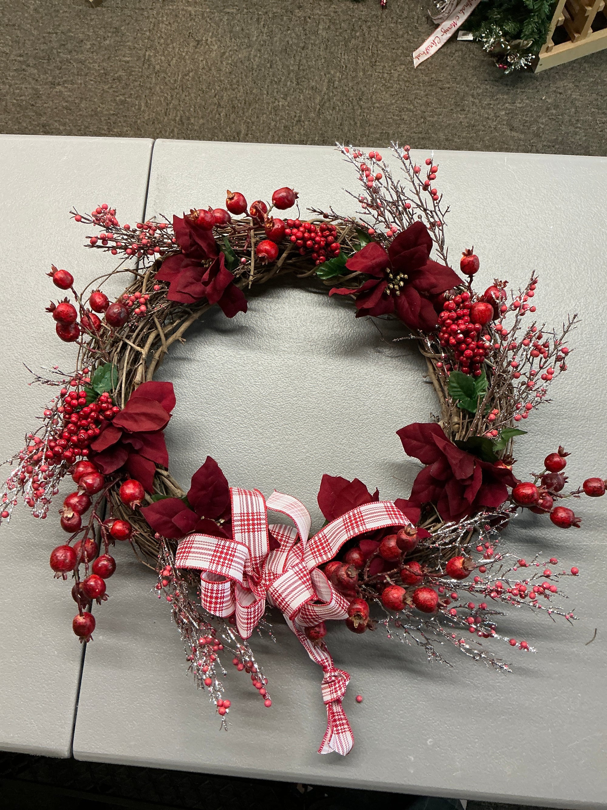 Poinsettia and Berries Wreath